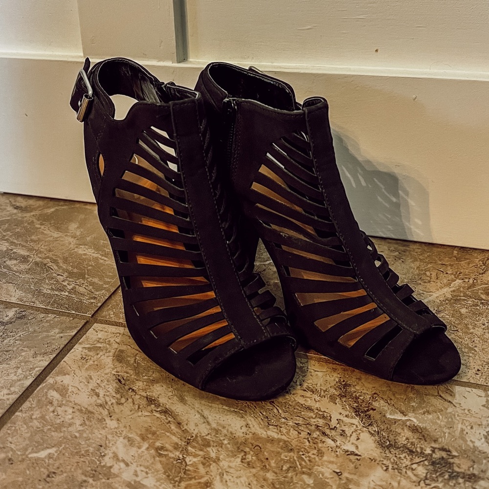 Black D Heart suede high heels.